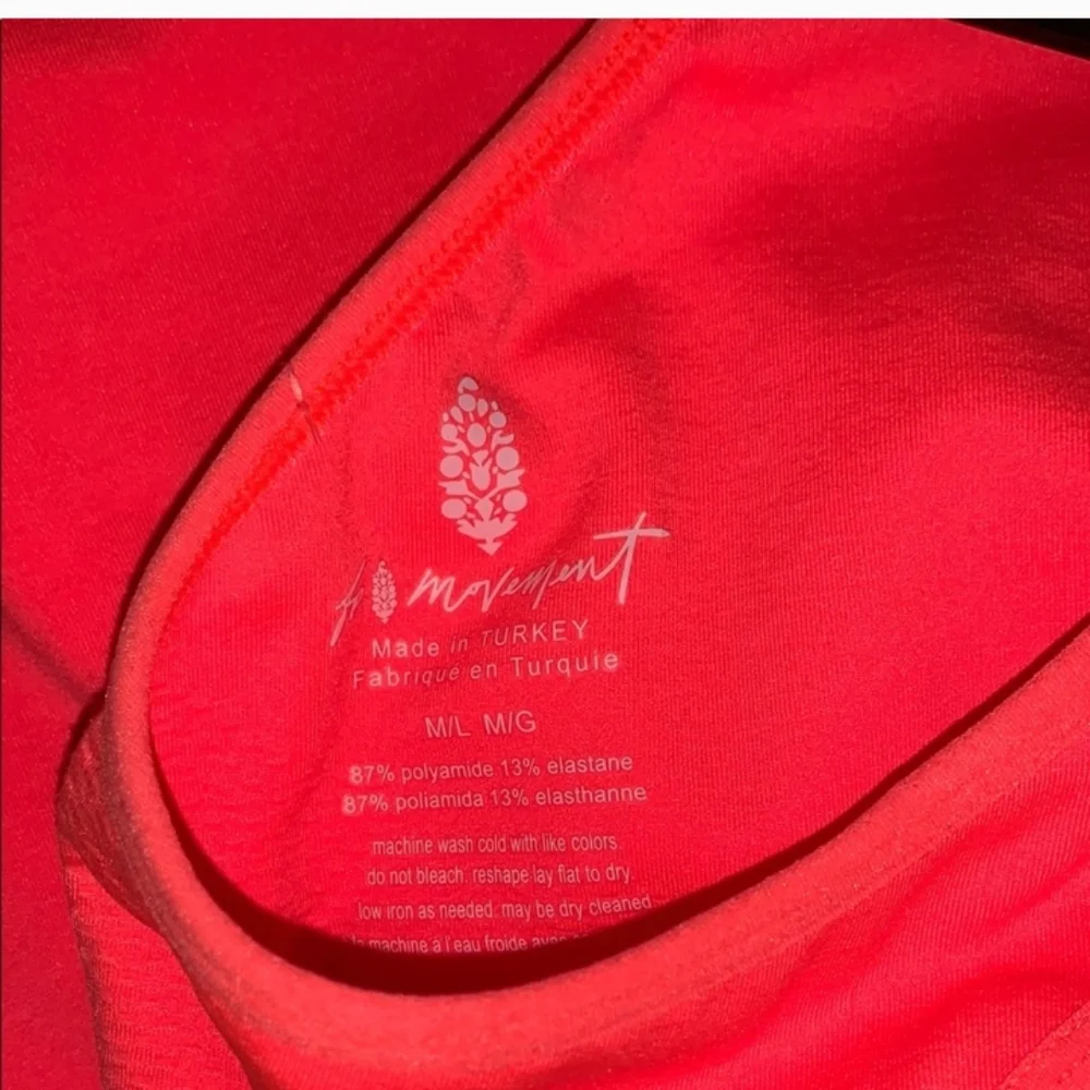 Free People Movement Every Single Time Runsie. NWTS Neon Coral sz M/L
